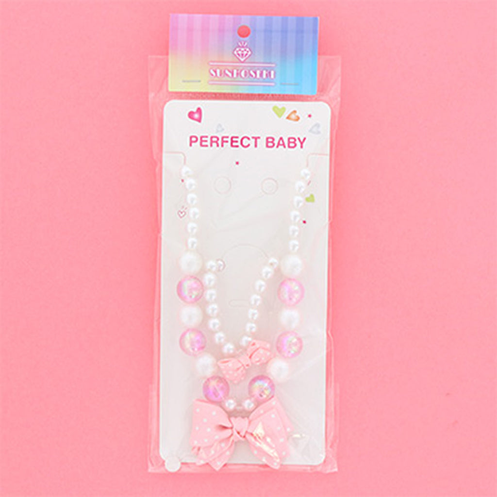 ピンク／パール＆ドットリボンビーズネックレス＆ブレスレットセット