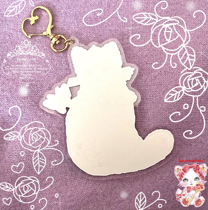 キラキラ夢とラメ降る お姫様のための特別な ハートのお守り宝石猫ちゃん (アクリルキーホルダー）／イラストレーター松下ぴんく