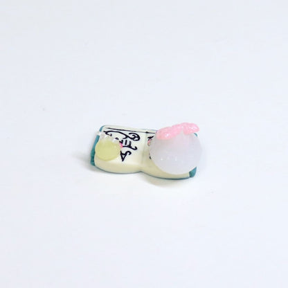 絵本から飛び出したミニほっぺちゃんと極ミニほっぺちゃんオブジェ